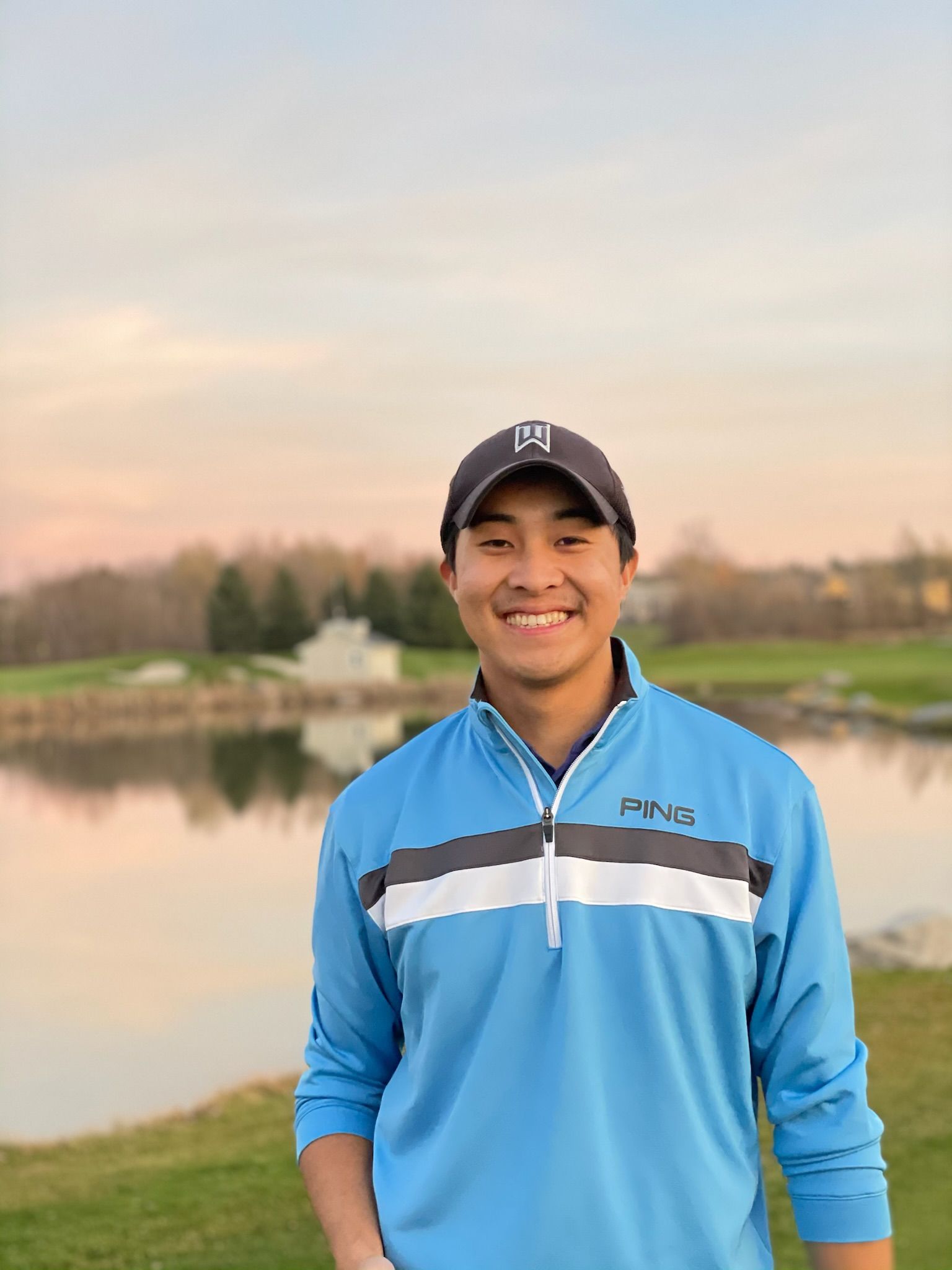 Jonathan golfing at sunset