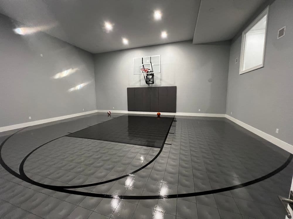 There is a basketball hoop in the middle of the room