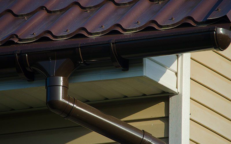 Gutters — Gutter On The Roof Of The House in Hyattsville, MD