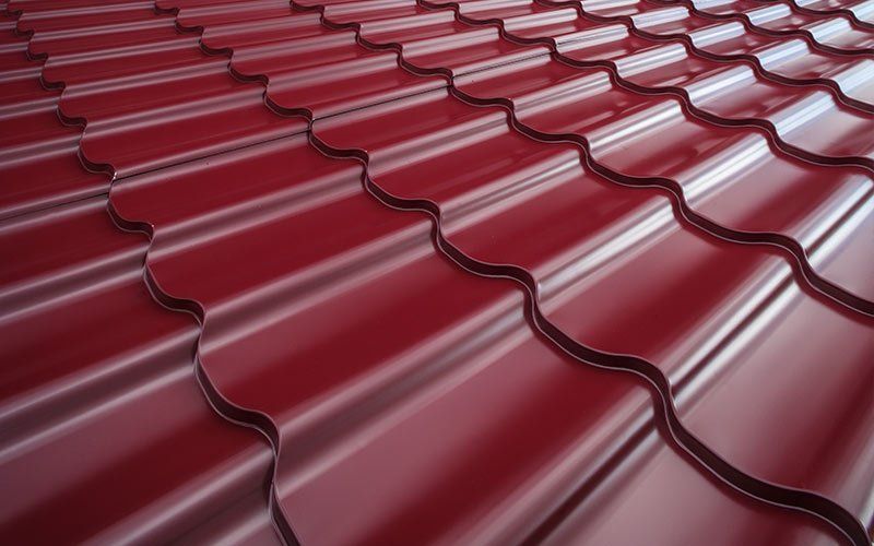 Gutter Repairs — Steel Roof Painted In Red Color in Hyattsville, MD
