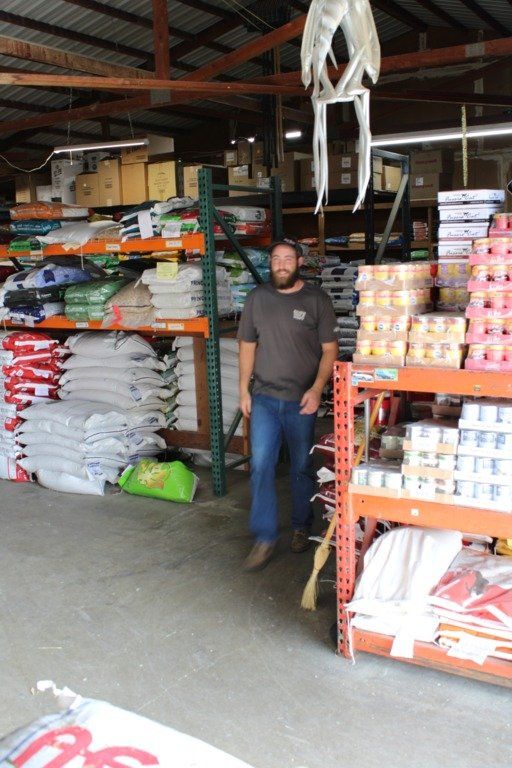 Man in Feed Section — Escalon, CA — Escalon Feed & Supply