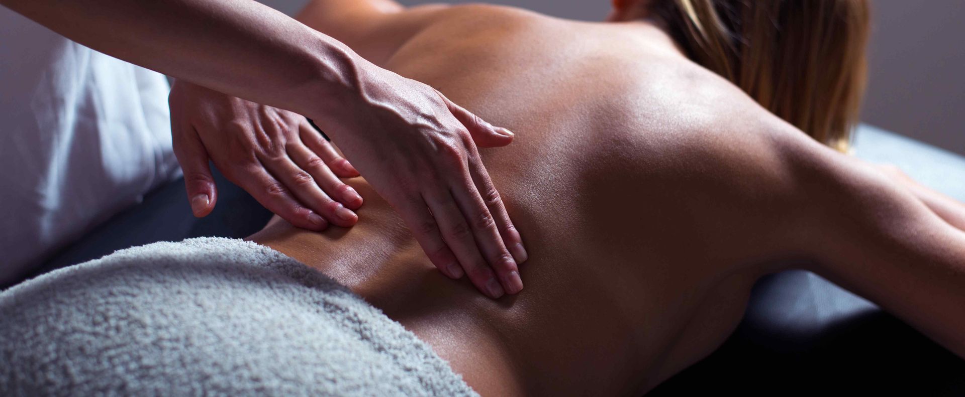 Massage Therapist massaging lower back