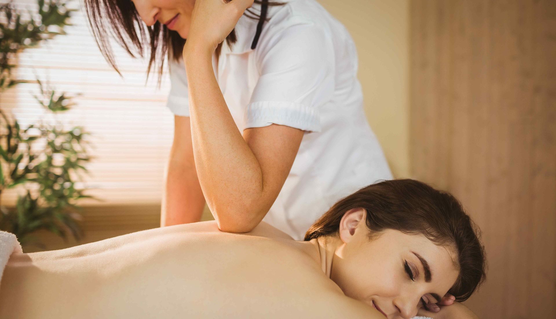 Therapist using Pressing Technique on Upper Back