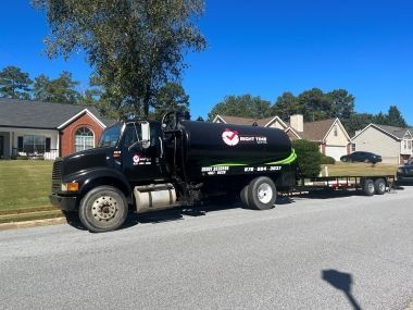 Septic truck parked on curb to pump septic tank in Lilburn ga