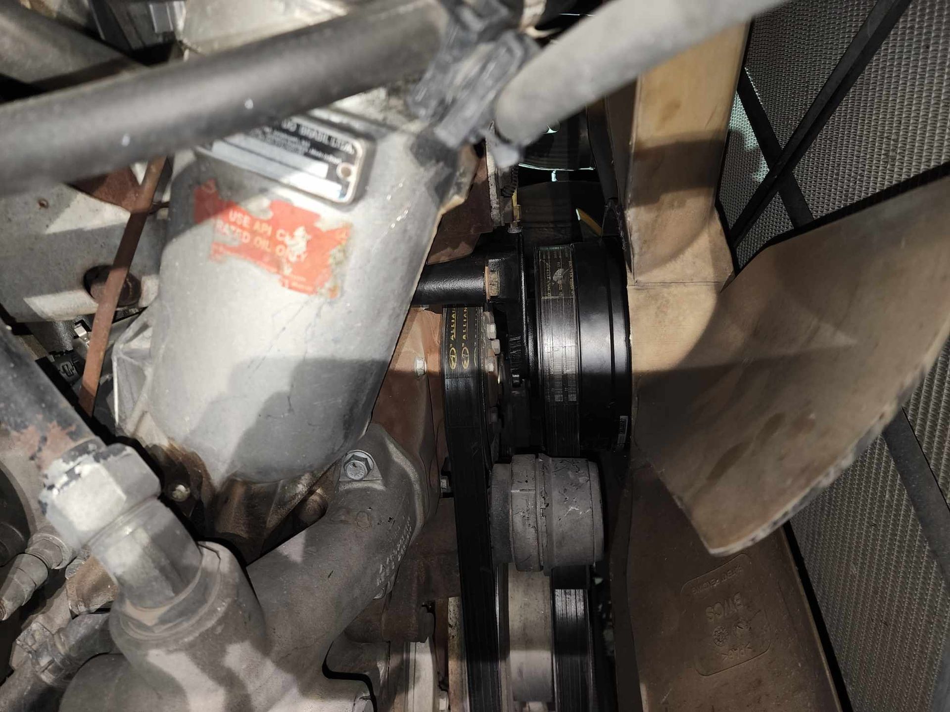 Engine components with a fan and belt system.