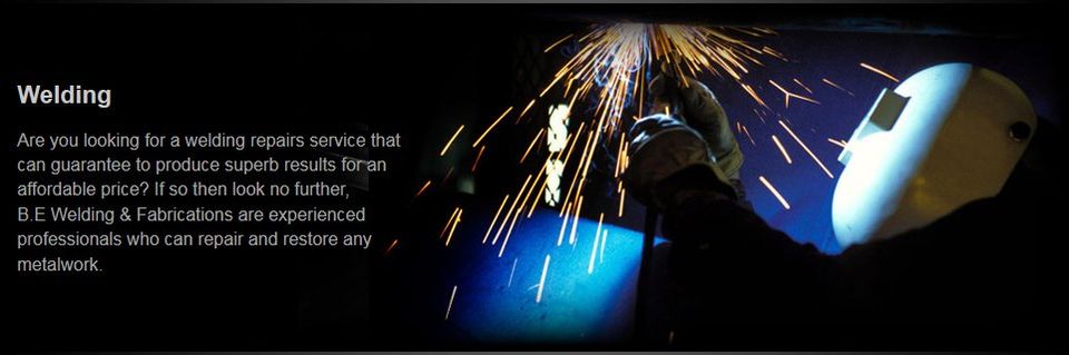 Sparks coming from a man welding