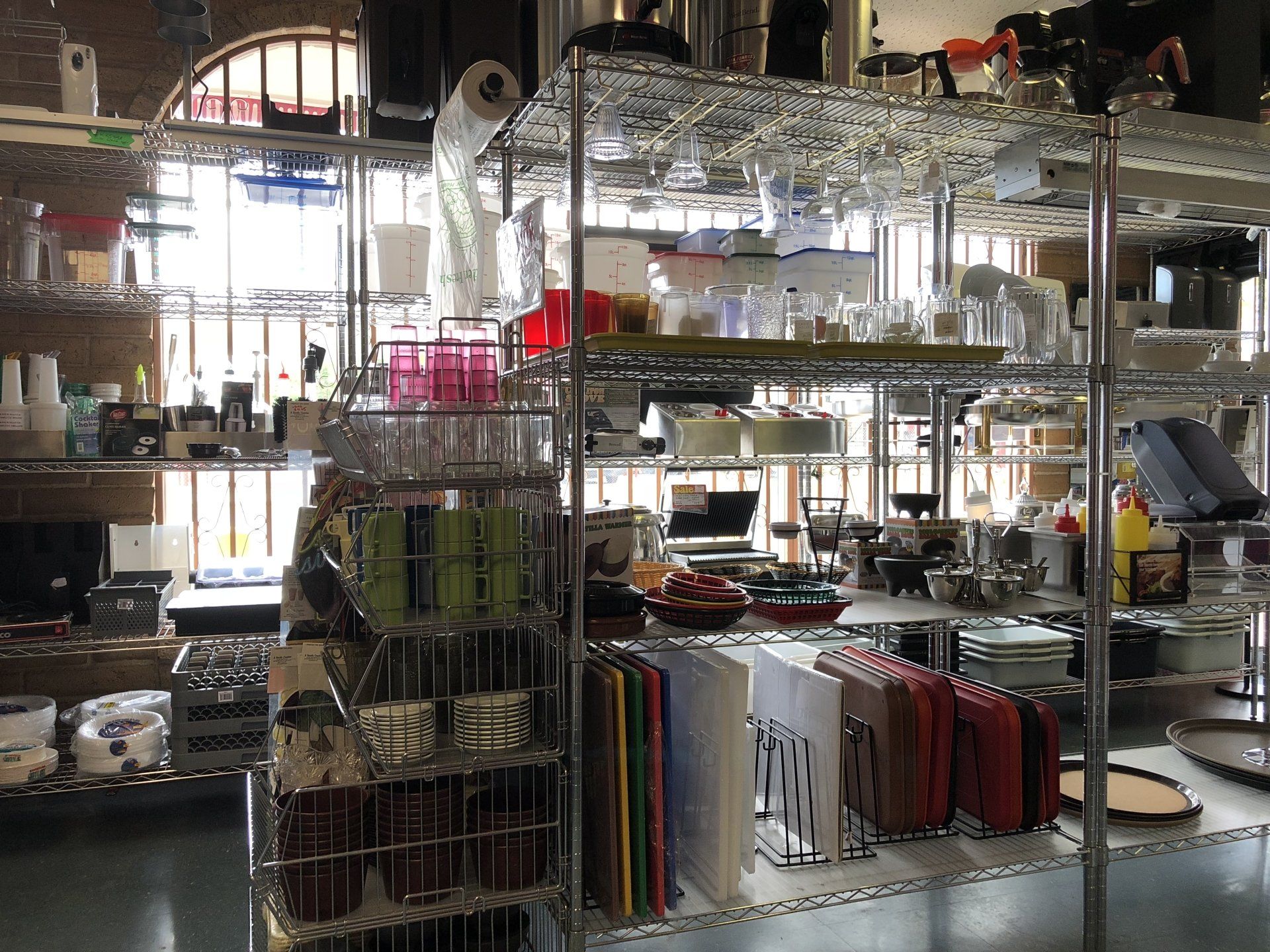 A store filled with lots of shelves filled with various items.