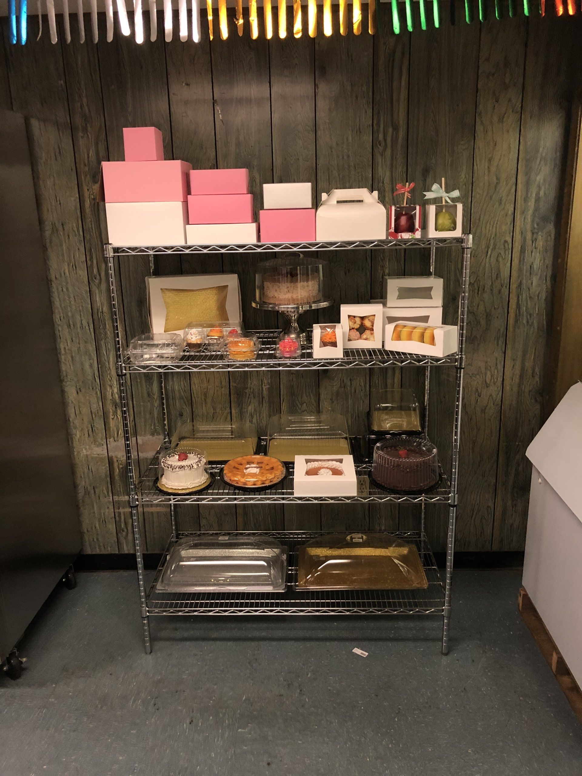 bakery items in boxes on shelving