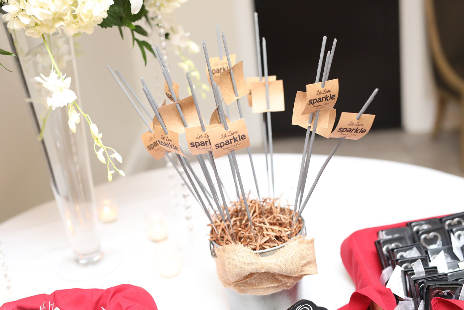 A bunch of sparklers are sitting on a table.