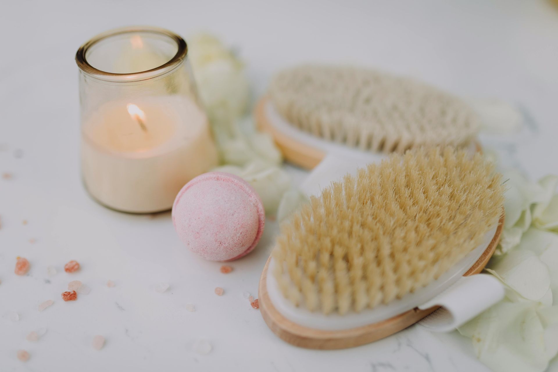 Decorations with candle, bath bomb. and brush