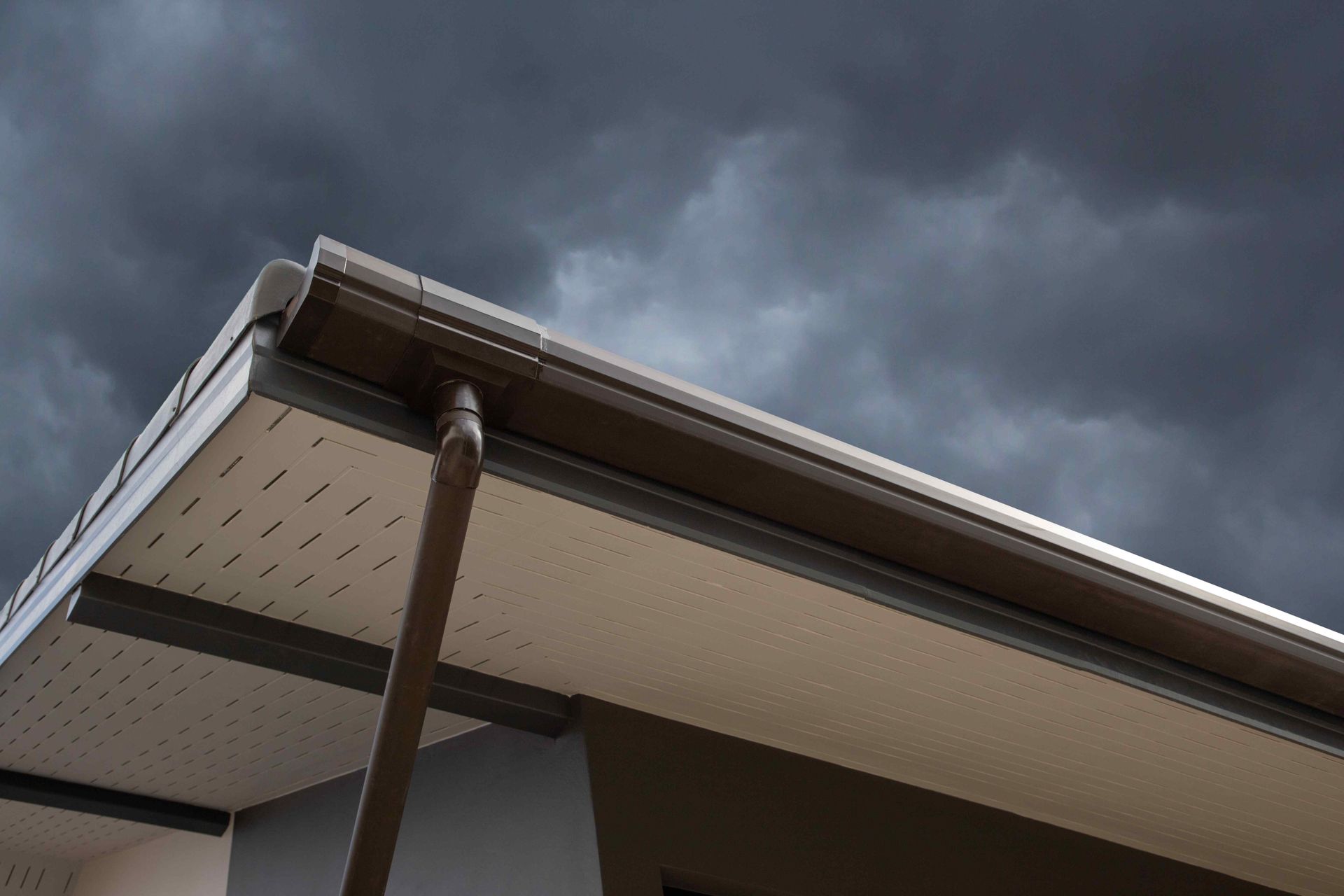 Stormy clouds loom threateningly over a home in the Midwest.