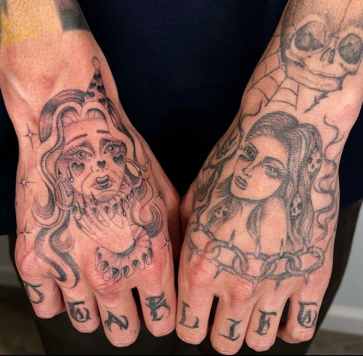 A person with a tattoo on their hands