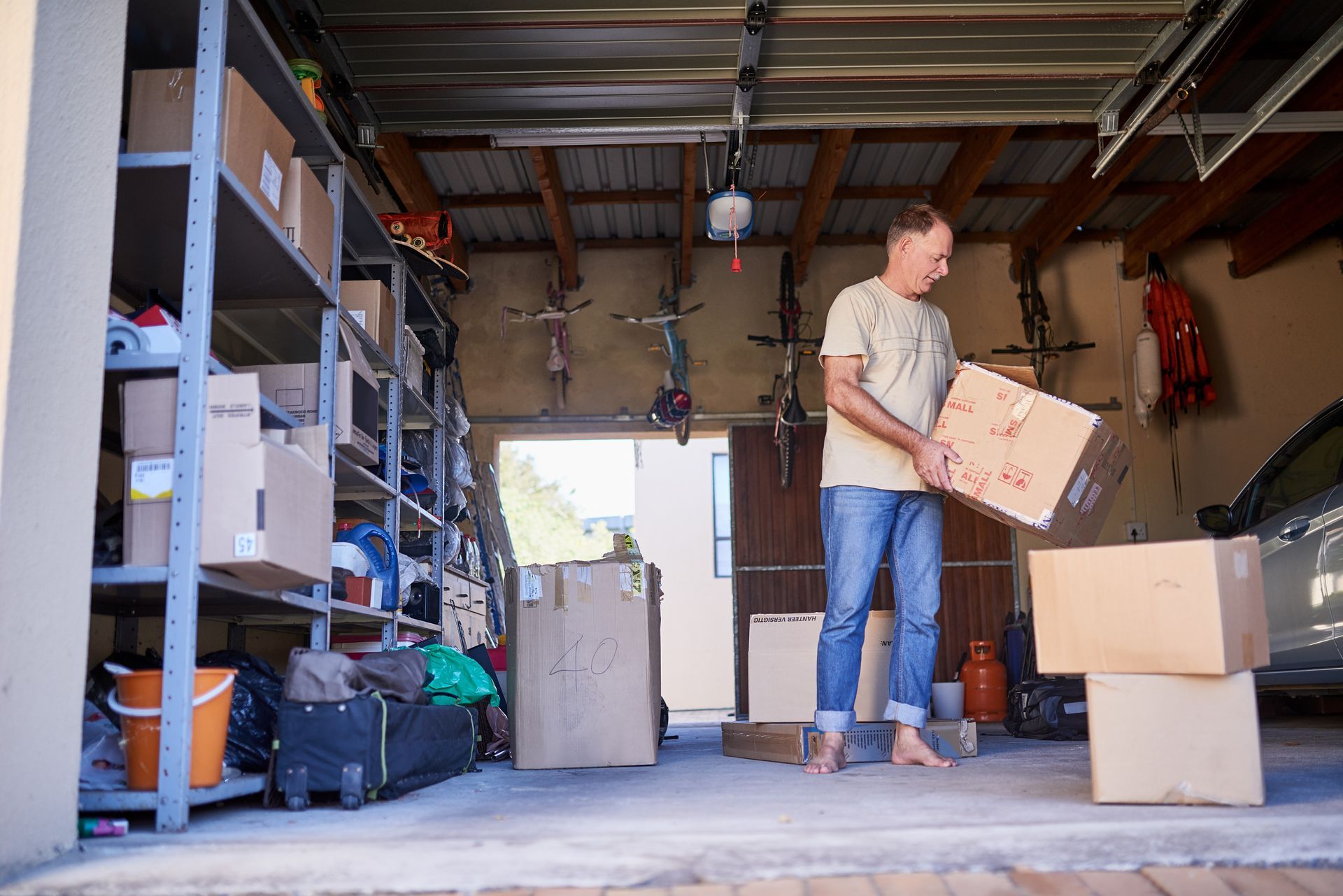 decluttering garage using storage unit