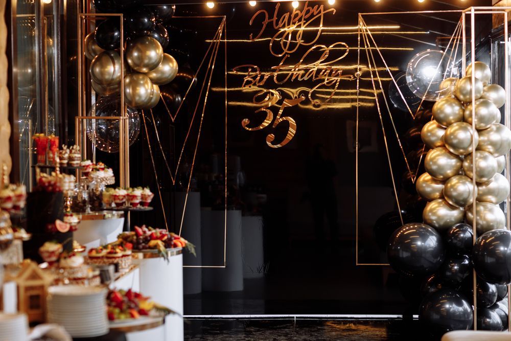A Room Decorated For a Birthday Party With Balloons and Desserts — Event Hire in Albury, NSW