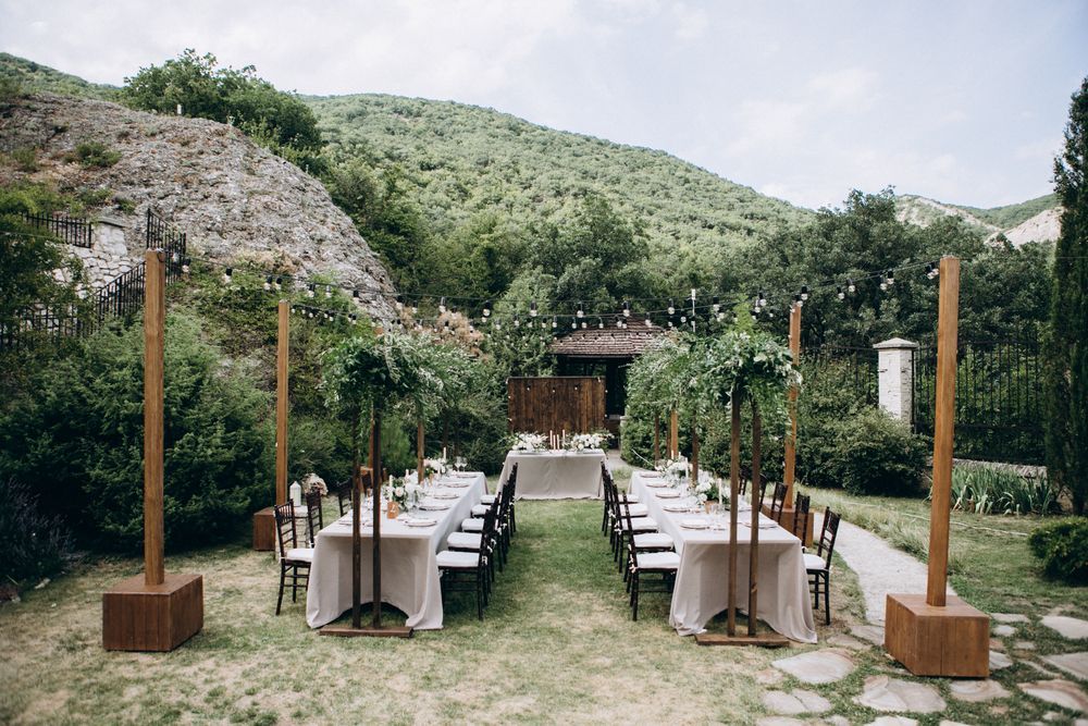 A Long Table and Chairs are Set Up For a Wedding Reception in The Mountains — Event Hire in Wodonga, NSW
