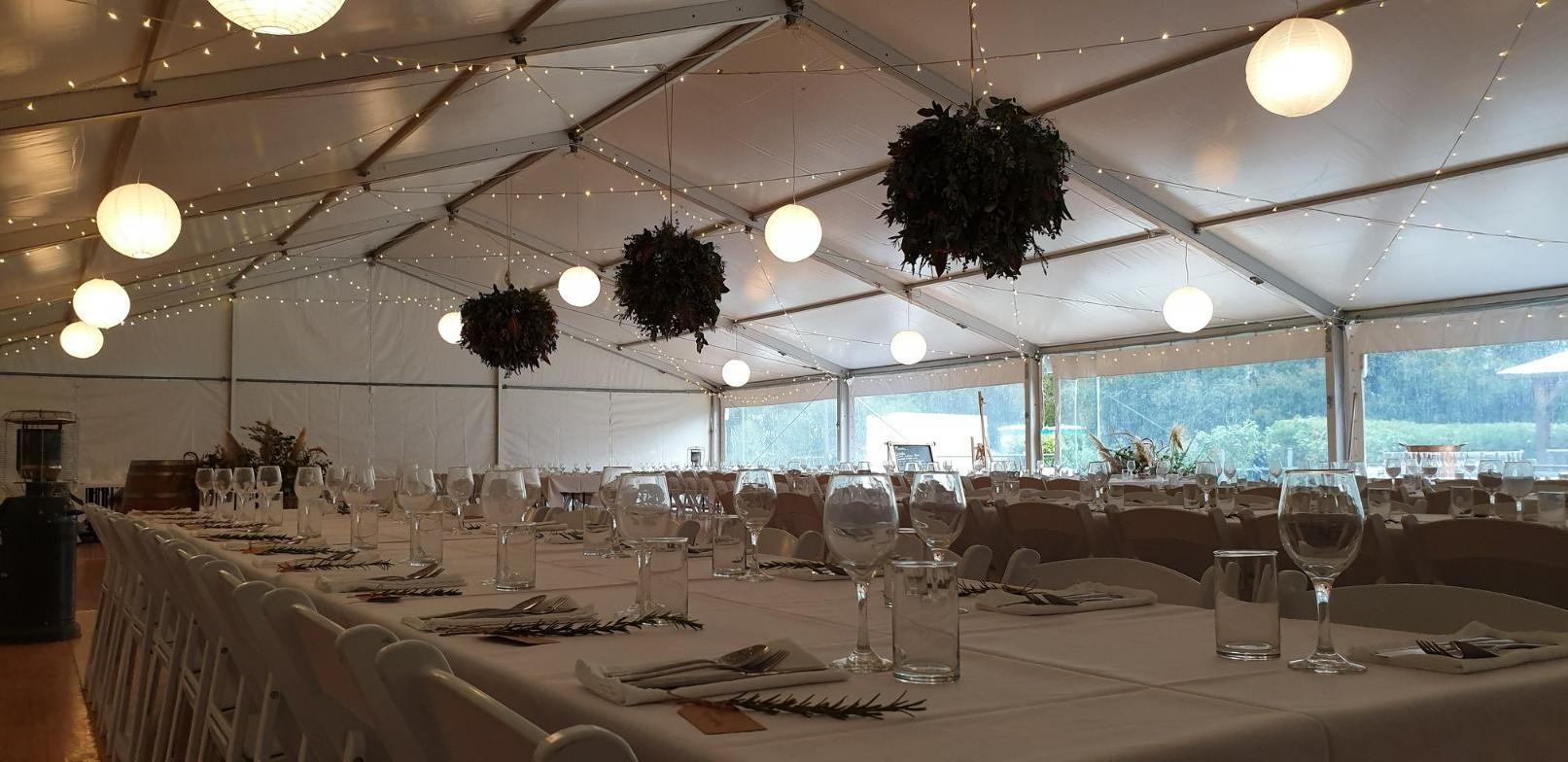 A Long Table is Set For a Wedding Reception Under a Marquee — Event Hire in Wodonga, NSW