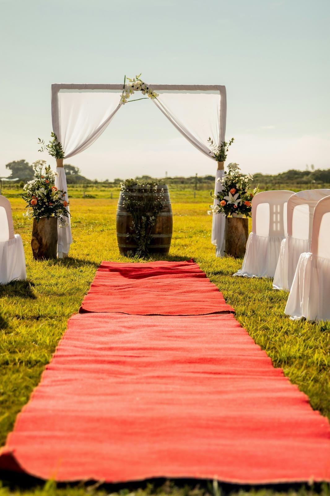 Red Carpet Leading to Wedding Ceremony in a Field — Event Hire in Wodonga, NSW