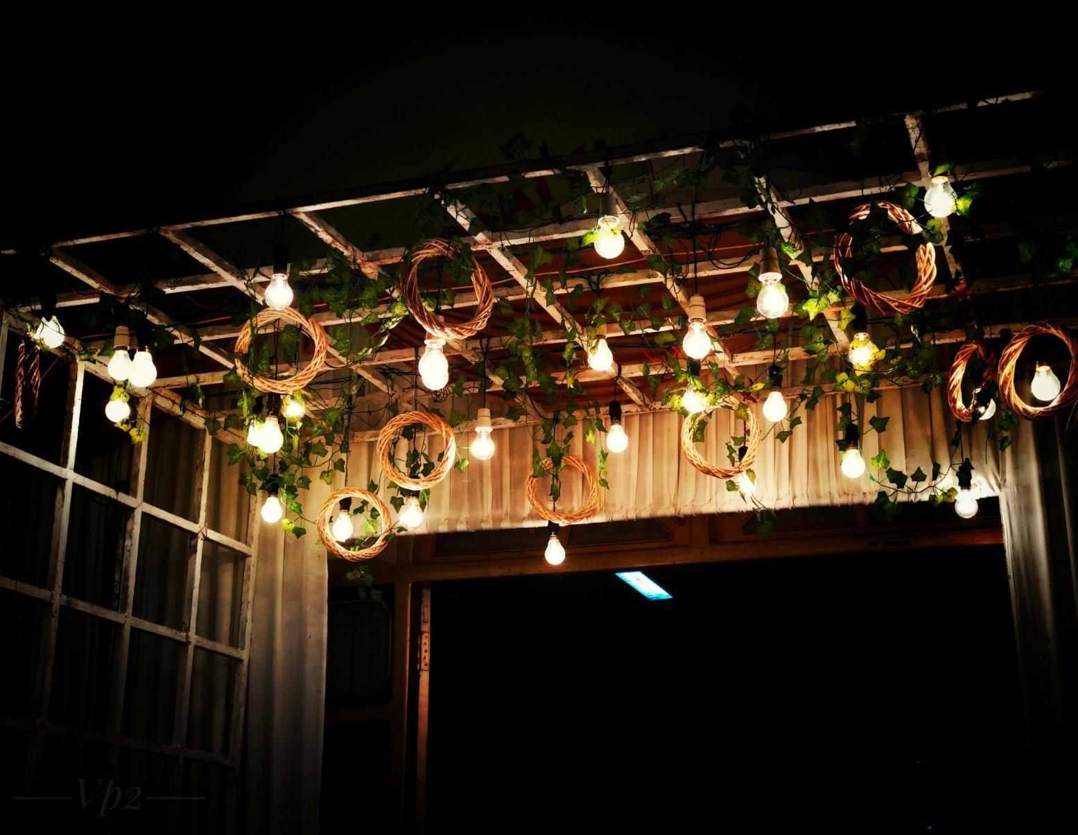A String of Lights is Hanging From The Ceiling of a Room — Event Hire in Wodonga, NSW
