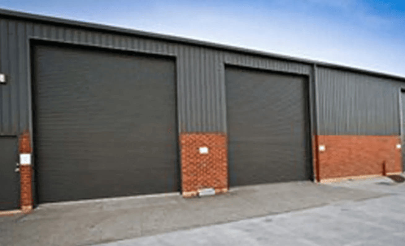A building with a lot of garage doors on it