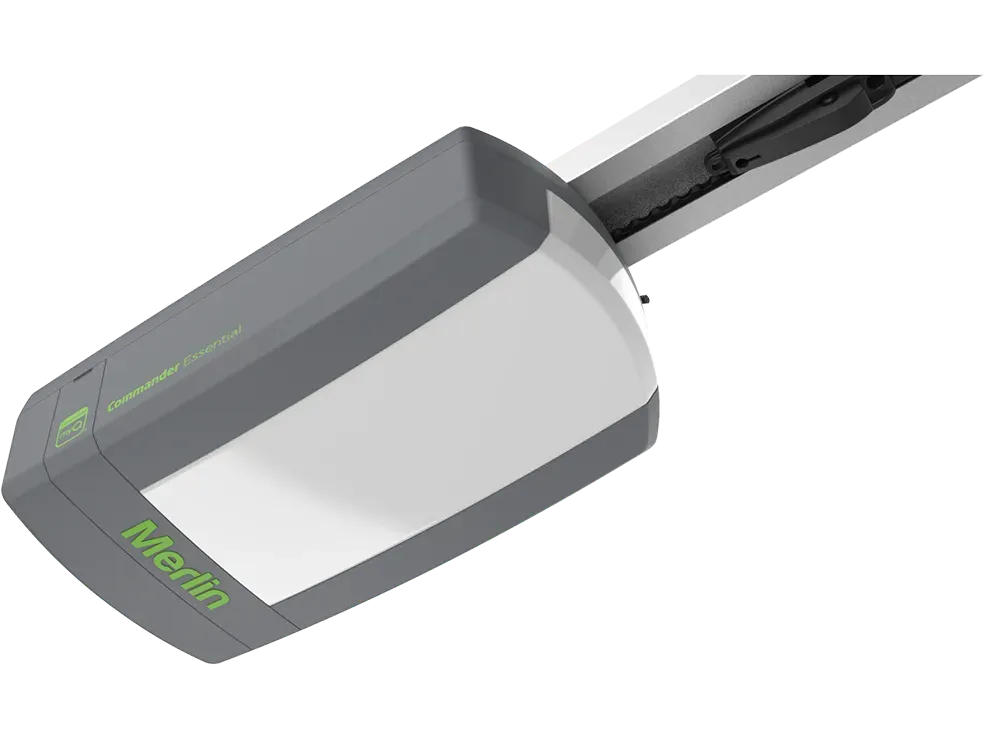 Gray and white Merlin garage door opener with green label.