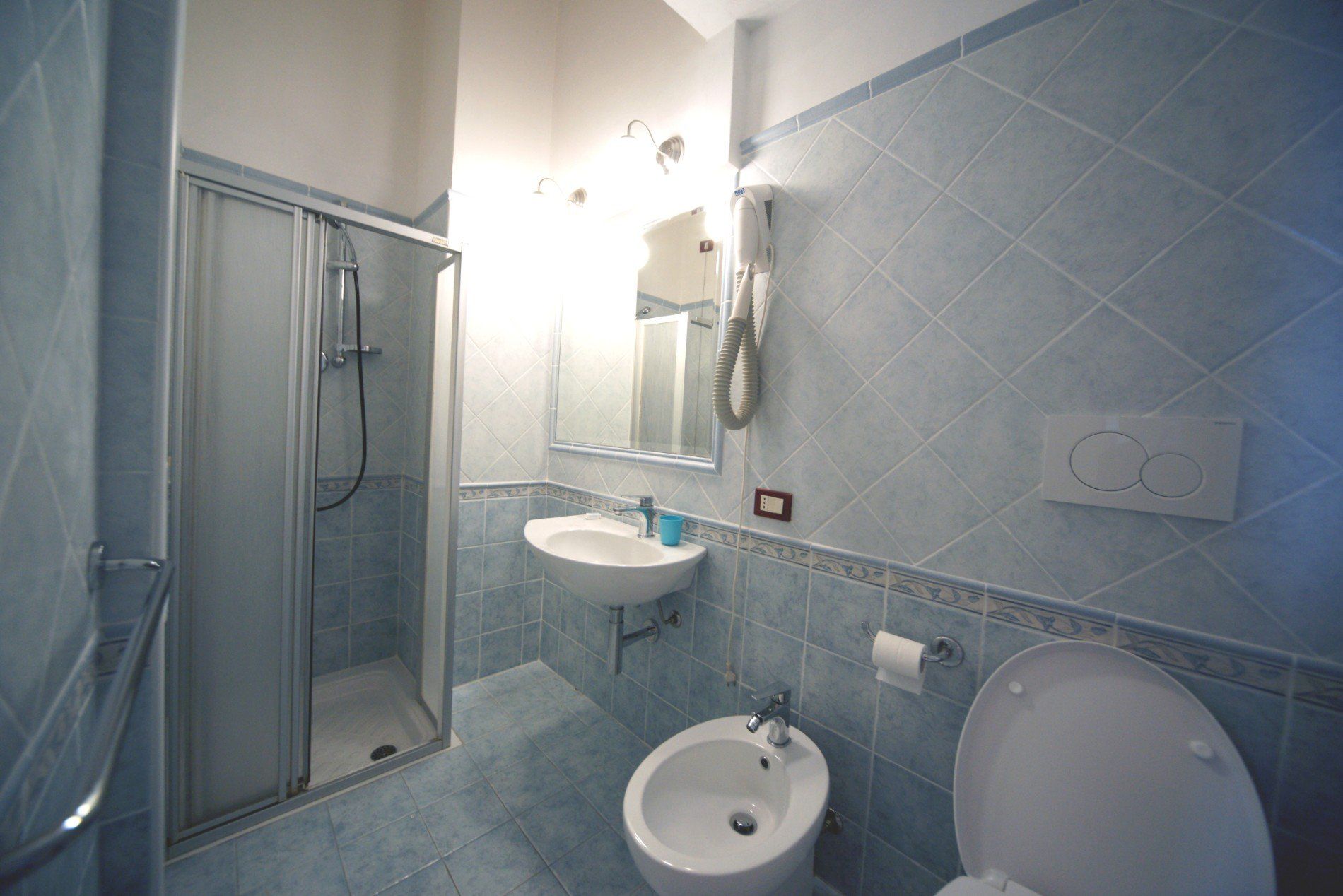 fully equipped and comfortable bathroom at hotel with sea view
