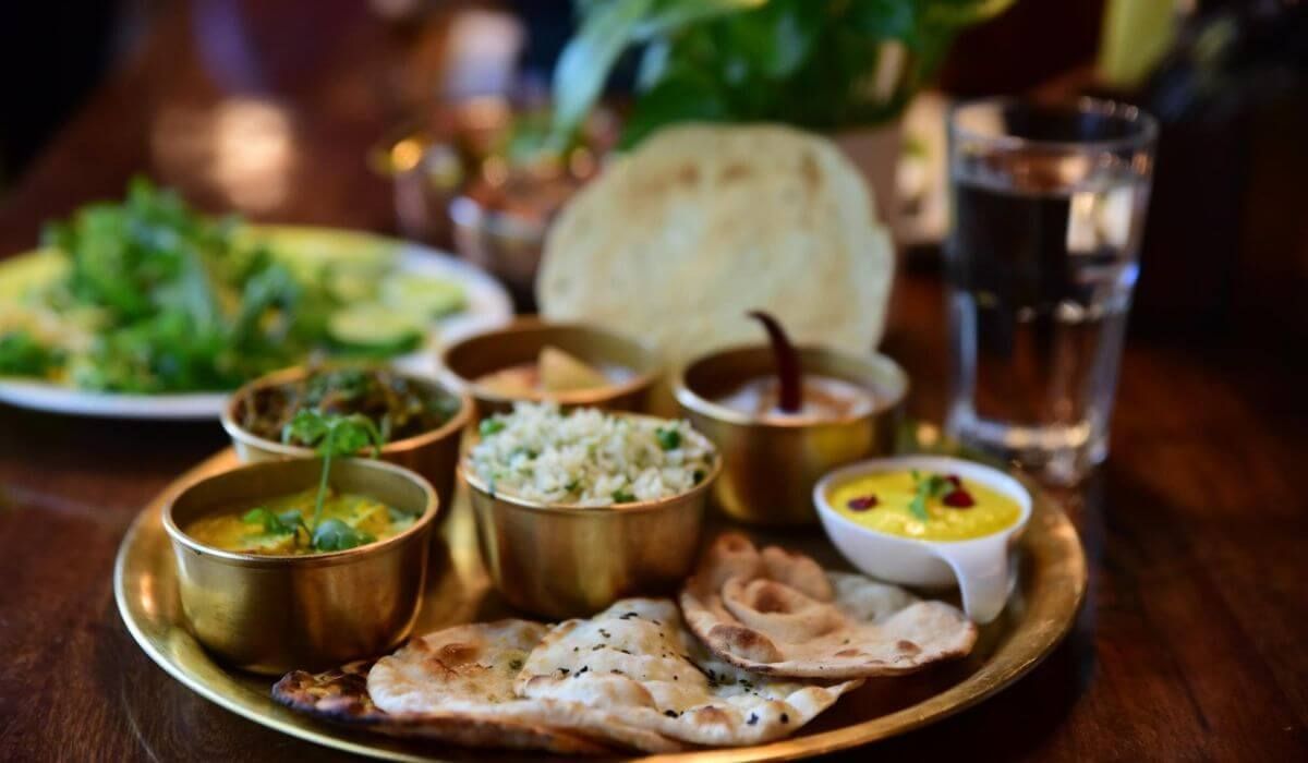 A variety of Indian dishes served on a banquet table