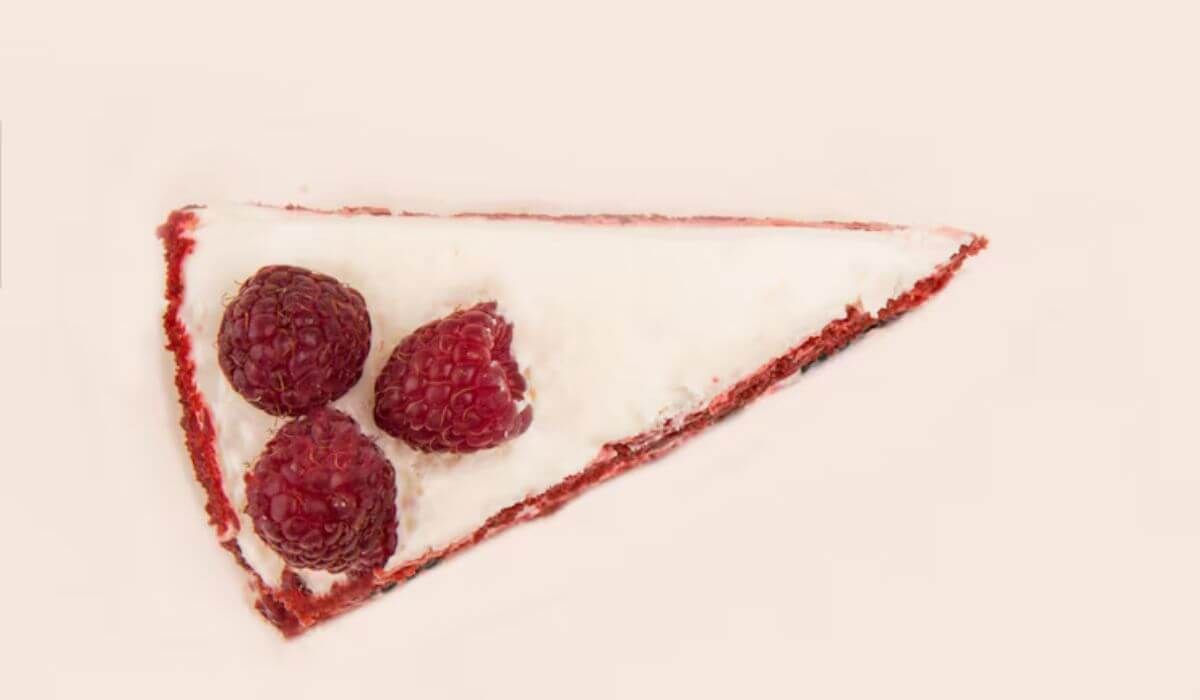 Raspberry pistachio rosewater cake slice