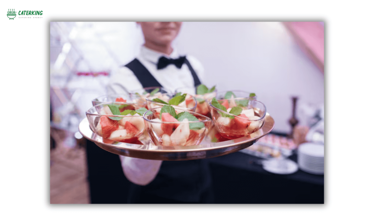catering staff serving large wedding
