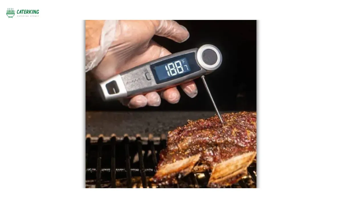checking internal temperature of pork shoulder with digital thermometer
