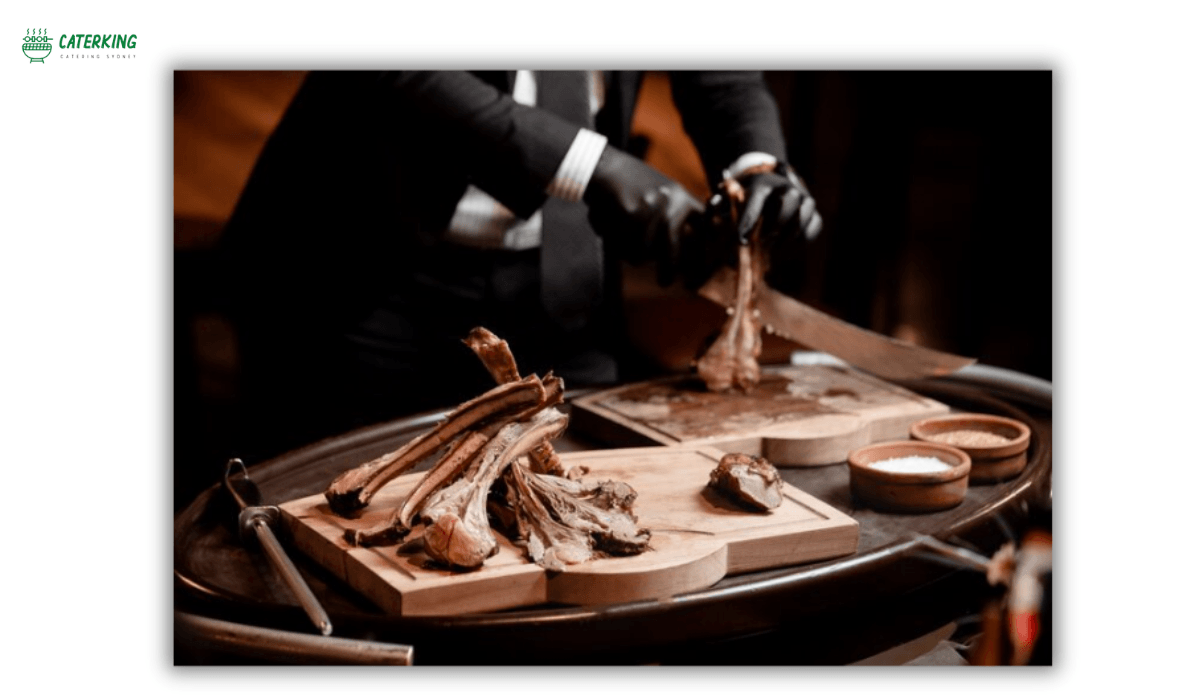 chef carving lamb at event catering
