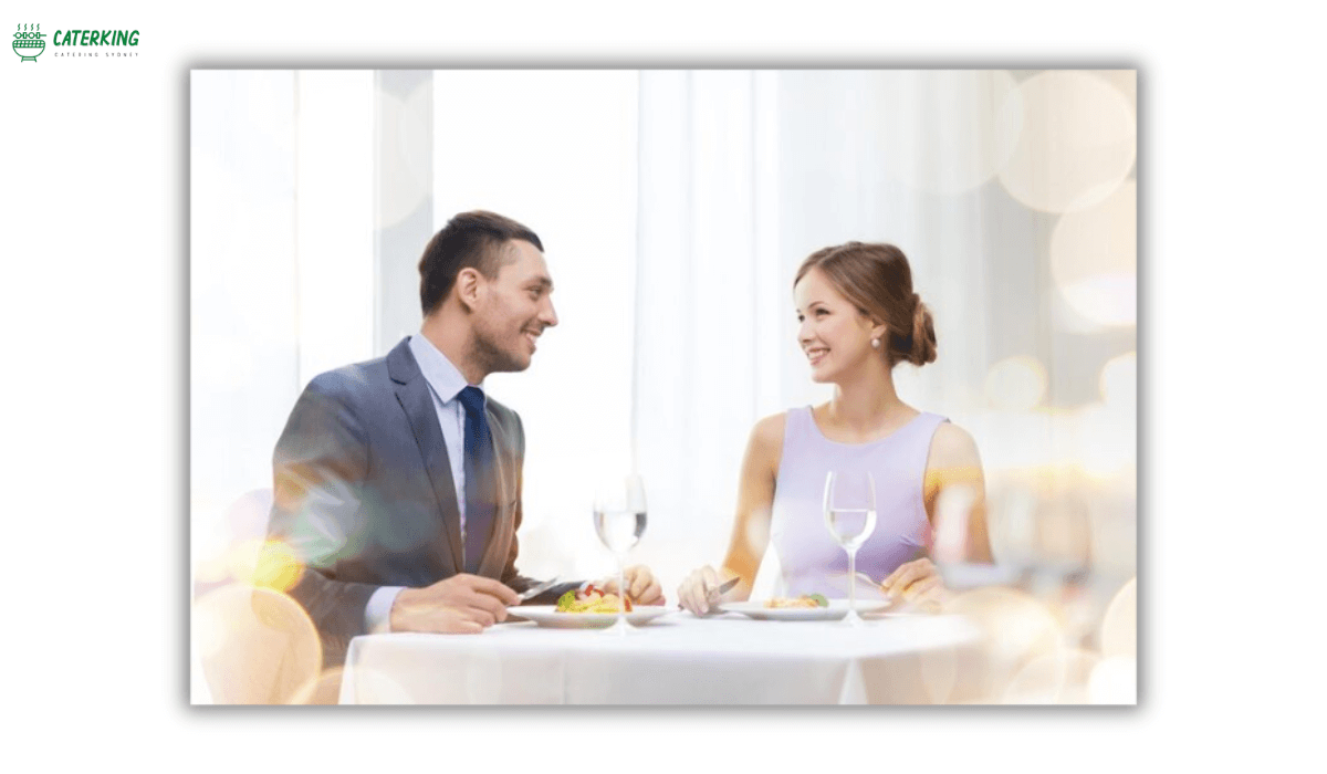 couple meeting wedding caterer