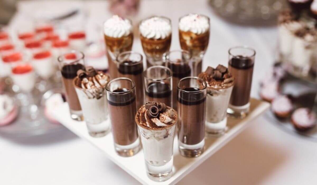 dessert table with chocolate fountain
