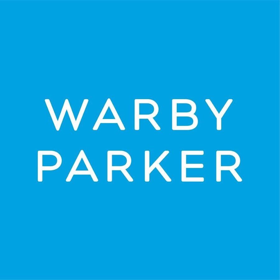 The warby parker logo is on a blue background.