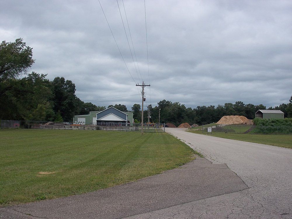 A road with grass on the side — Dowagiac, MI — Williams A-1 Expert Tree Service