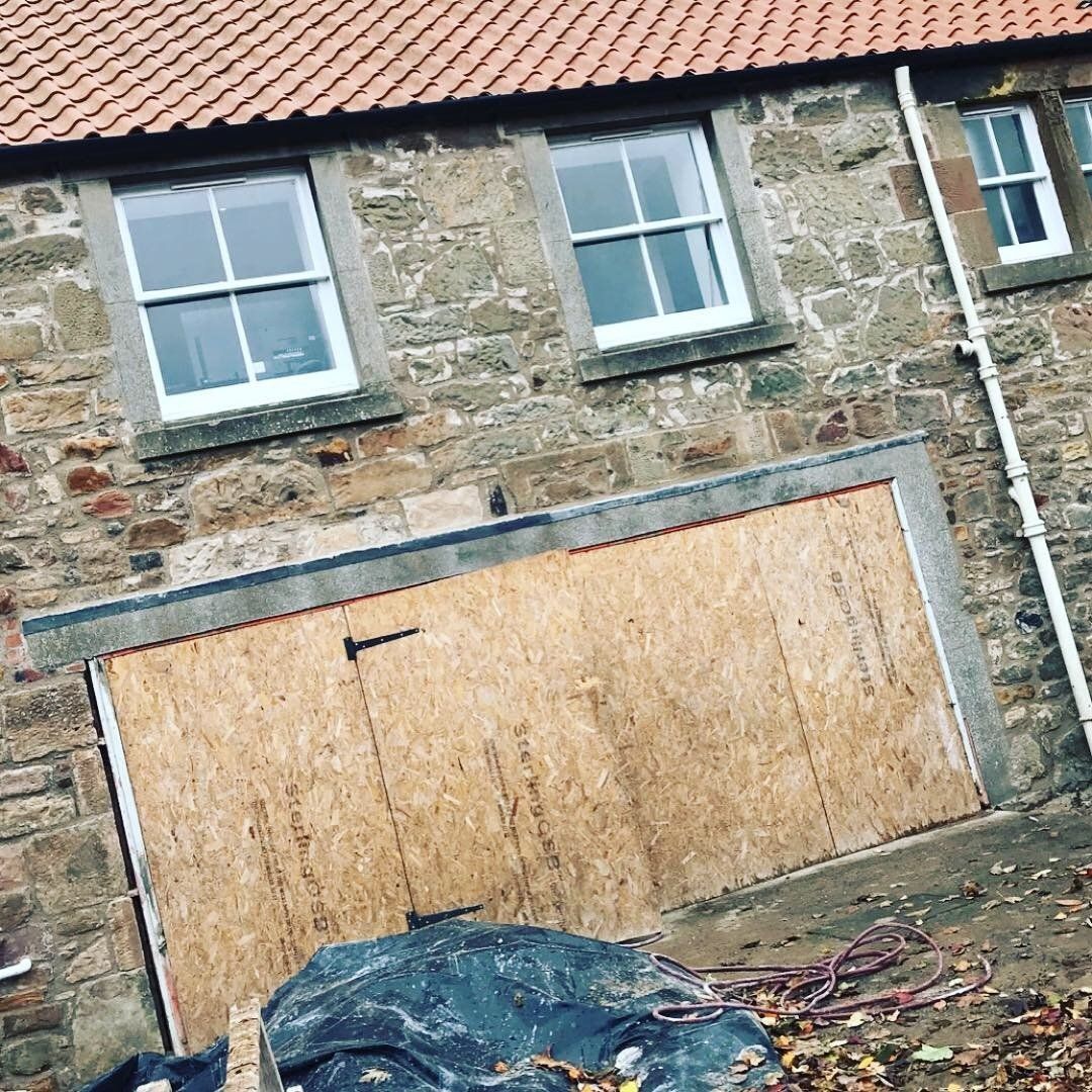 windows and stone wall