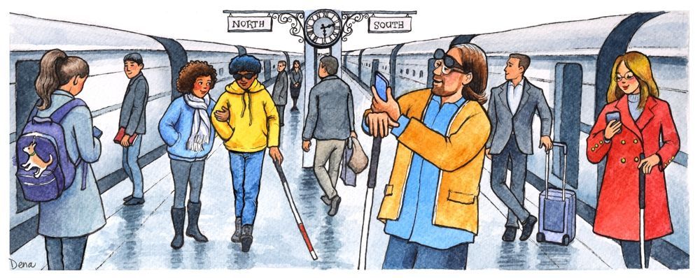 An illustrated scene of a busy train station platform where several blind and low vision individuals use white canes to navigate. A man in a yellow jacket and blue hat walks with his cane while a woman with curly hair walks beside him. Another man in an orange coat smiles while holding a white cane and a smartphone. A woman in a red coat also uses a cane while checking her phone. Other commuters with luggage and backpacks move around them. A vintage-style clock and signs reading “North” and “South” hang overhead.