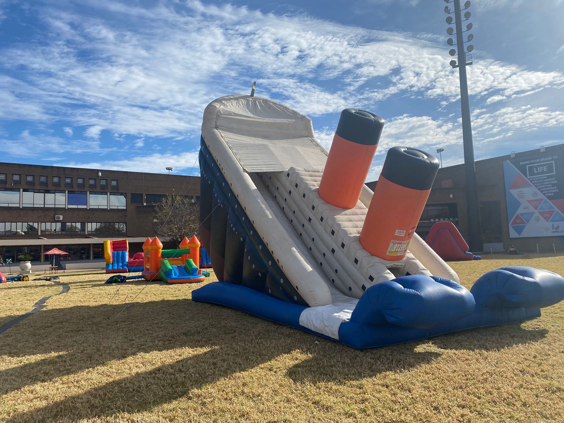 A large inflatable slide in the shape of a titanic ship.