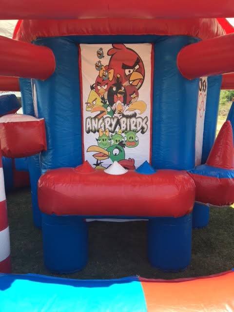 A bouncy house with angry birds on it