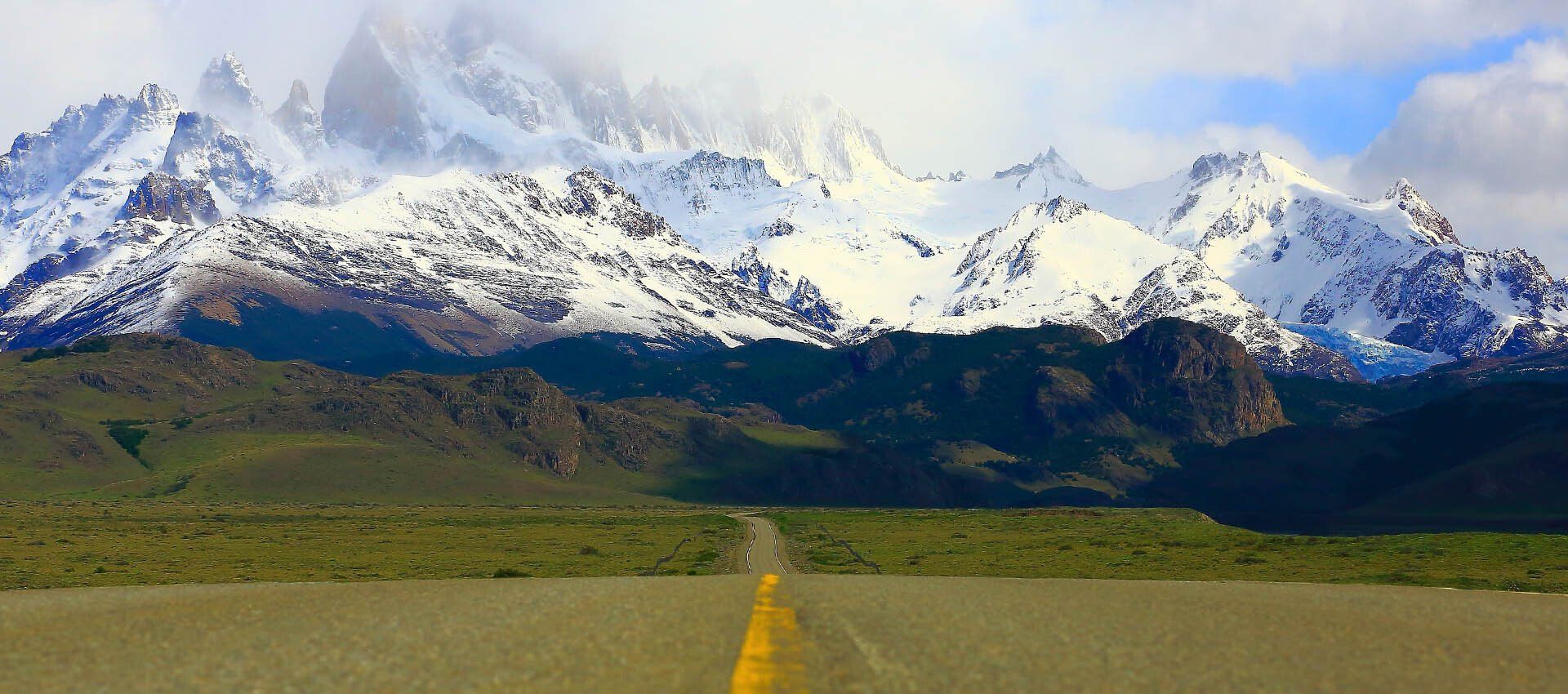 road leading toward mountains