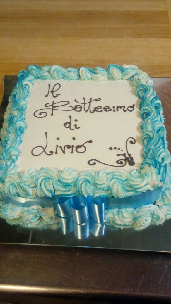 Blue and white baptism cake with