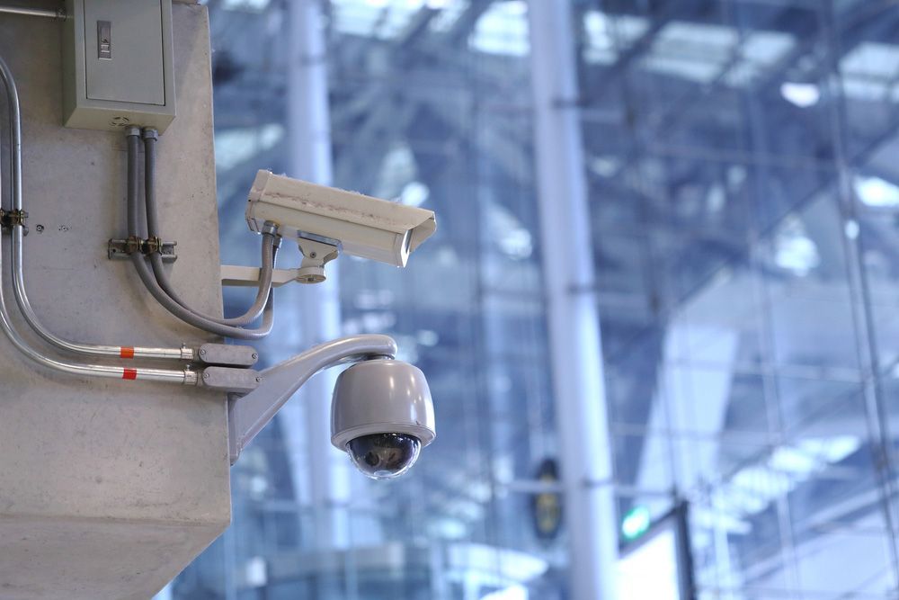 A security camera is mounted on a concrete wall — Locksmith in Surfers Paradise, QLD