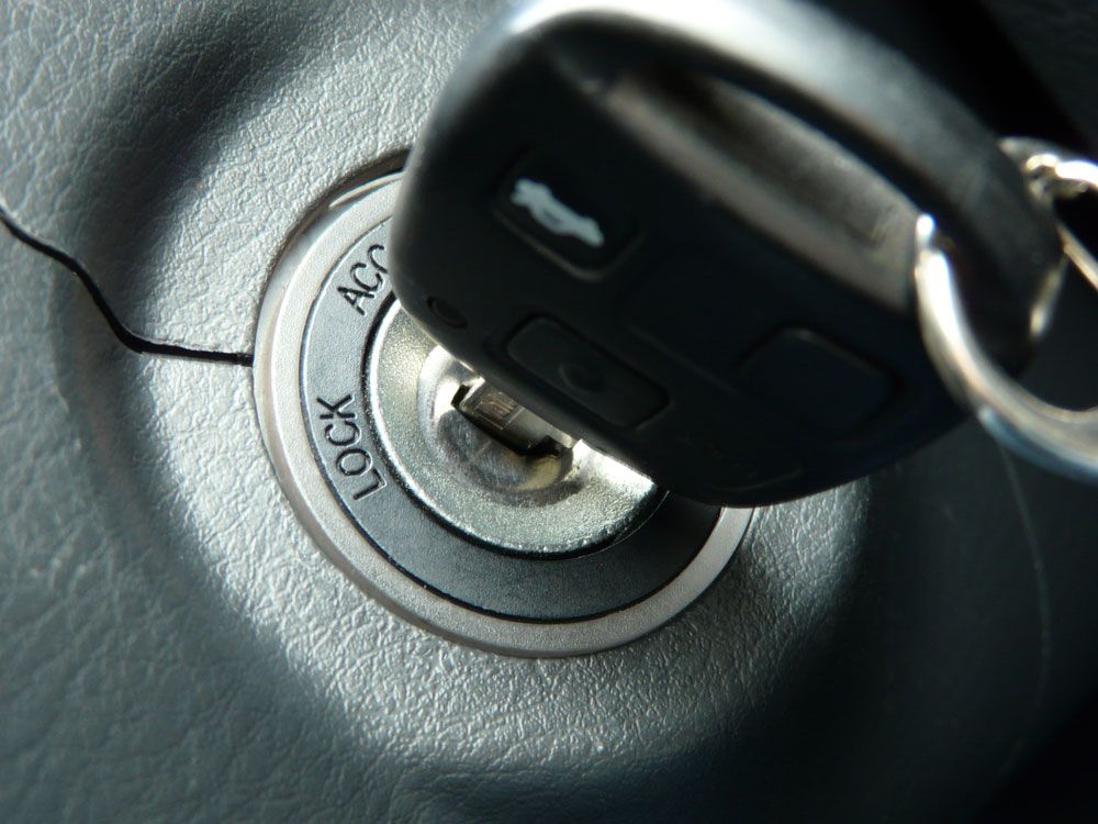 A close up of a car key in a lock — Locksmith in Brisbane, QLD