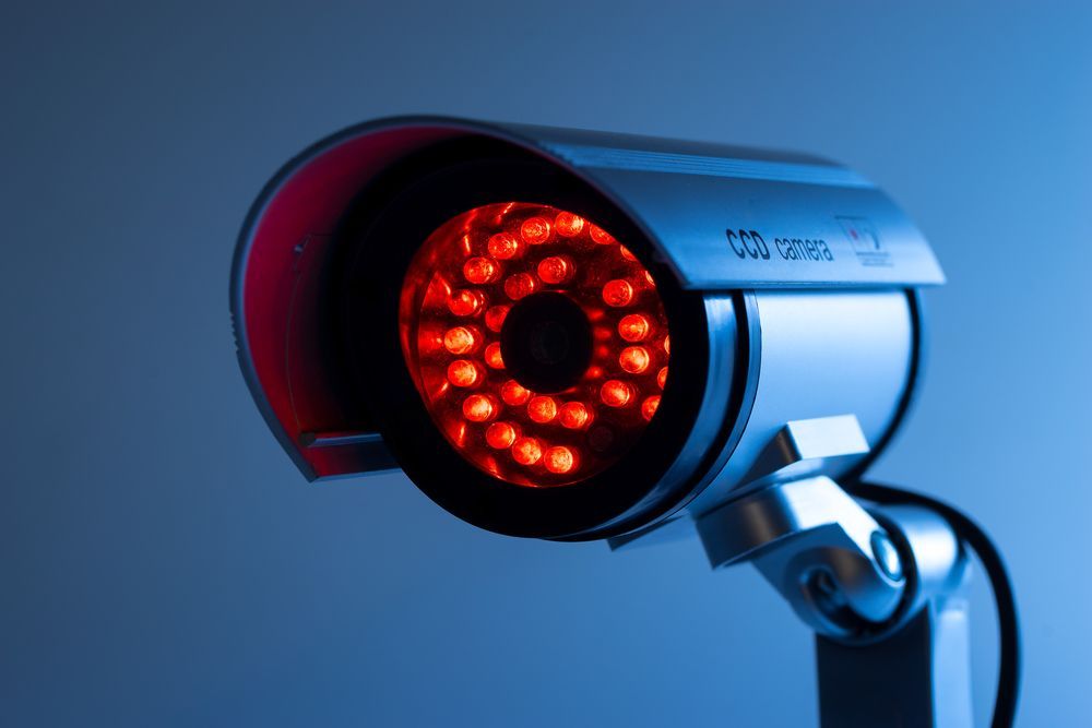 Close up of a cctv camera with red lights — Locksmith in Tweed Heads, NSW