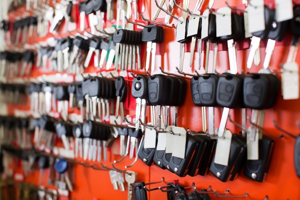 Bunch of car keys are hanging on a wall — Locksmith in Tweed Heads, NSW