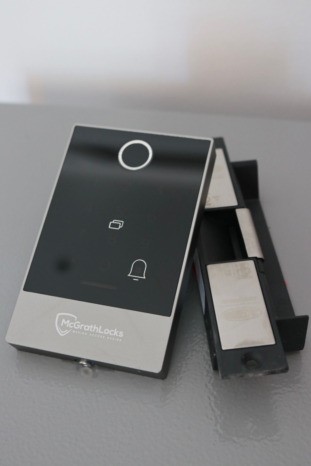 A bunch of keys and tools on a wooden table — Locksmith in Tweed Heads, NSW