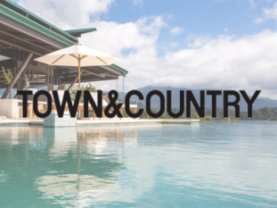 A picture of a swimming pool with the words town & country on it