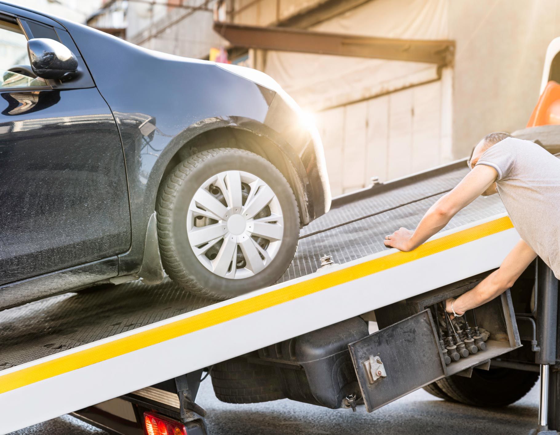 Towing Car — O'Fallon, MO — O'Fallon Garage Towing Car — O'Fallon, MO — O'Fallon Garage