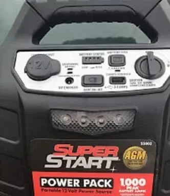 Black Super Start Power Pack, with 12V outlet, lights, and battery status indicators.