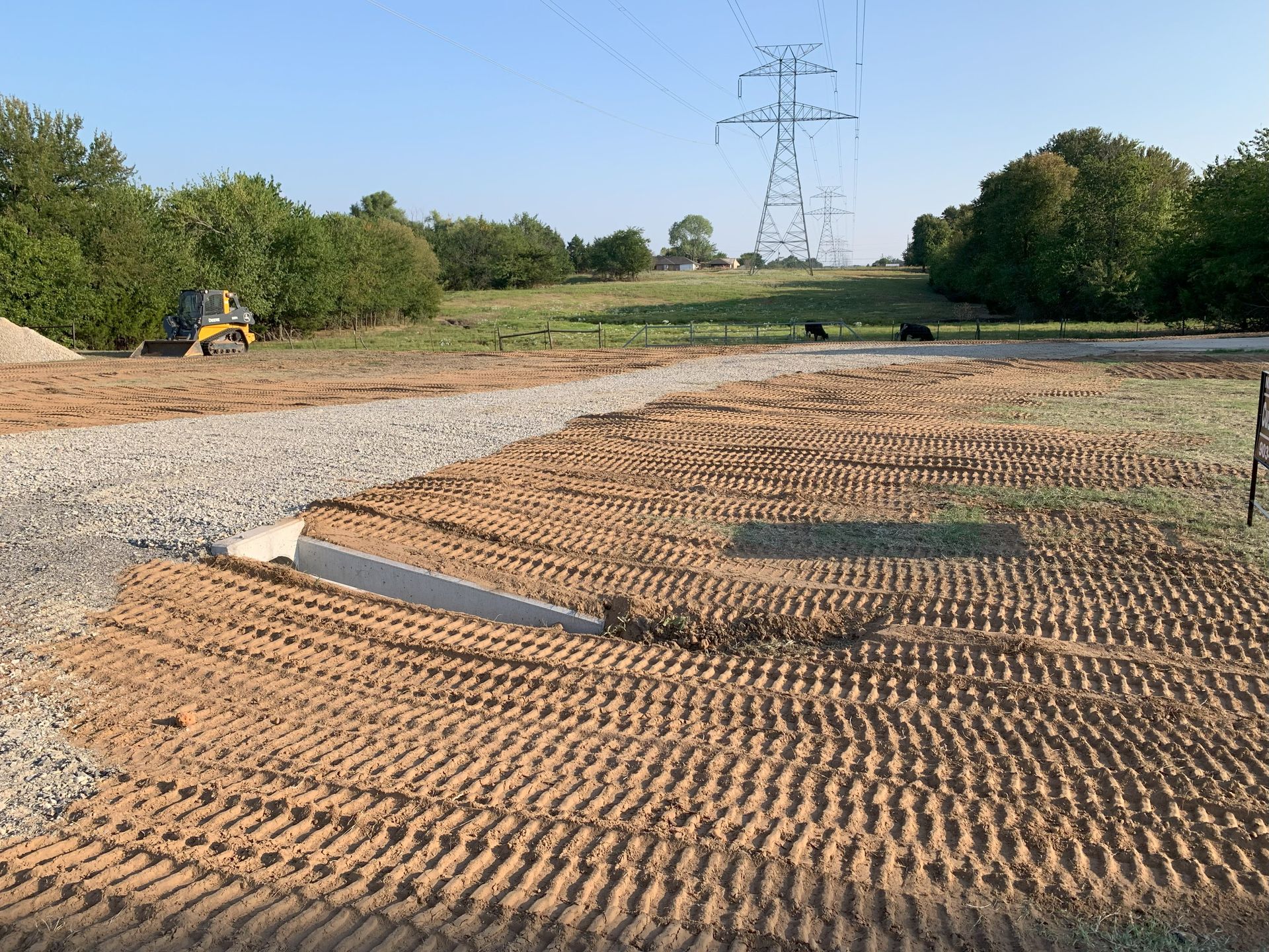 off duty land management land clearing excavation road work