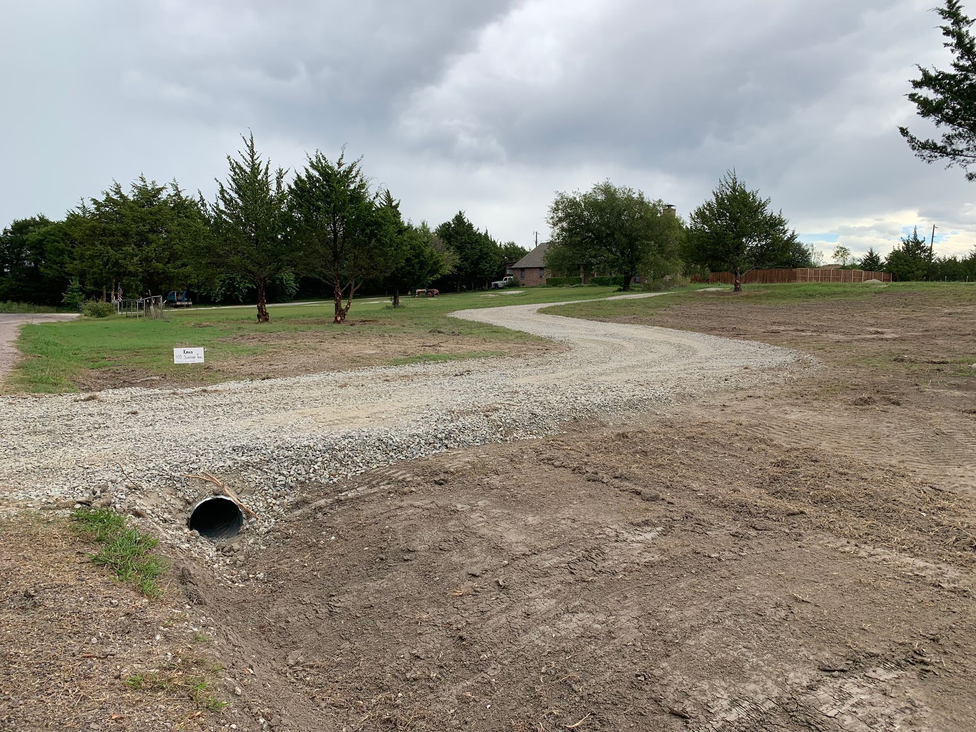 Road work, culvert and rock road